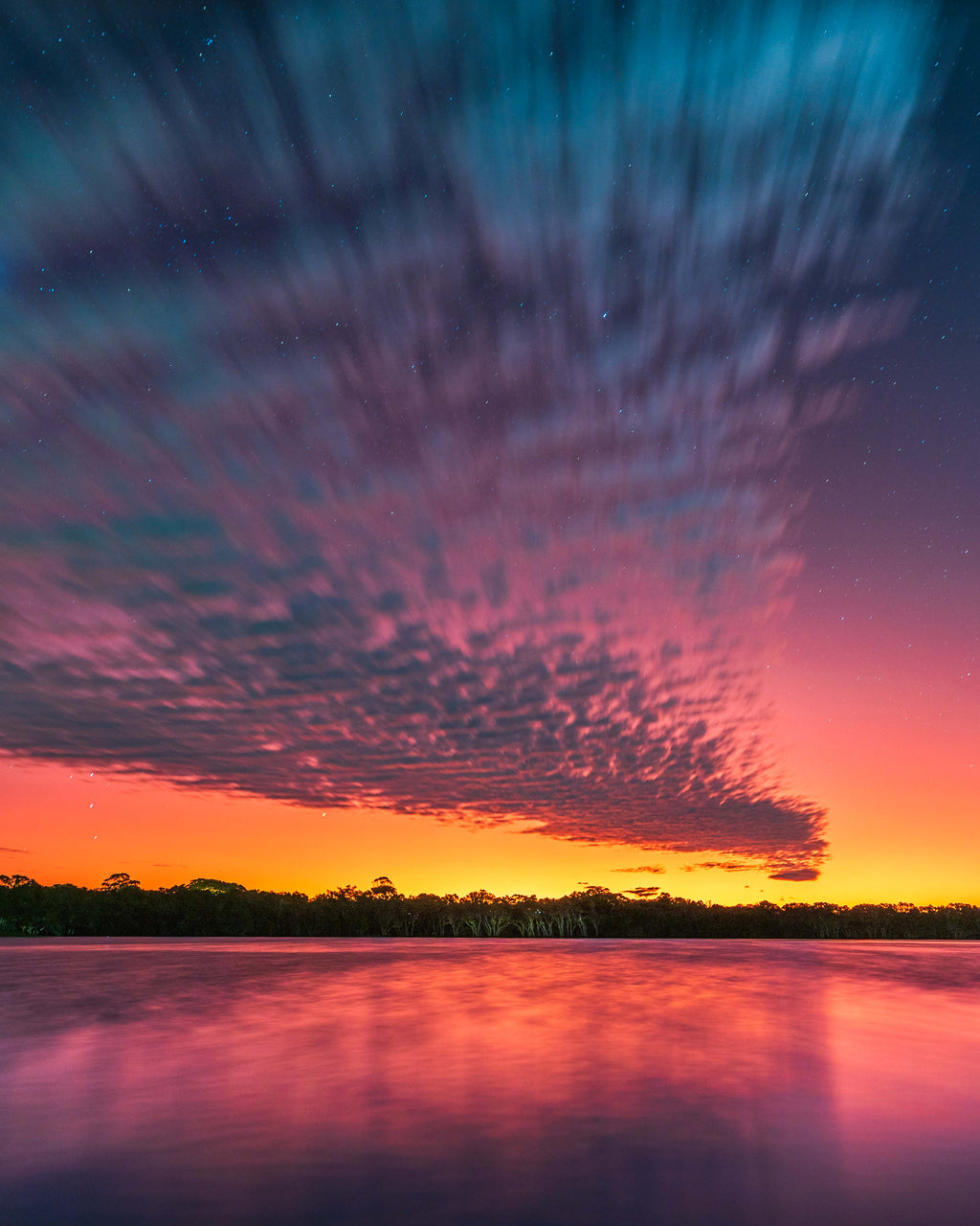 Lake ainsworth sunset reflection